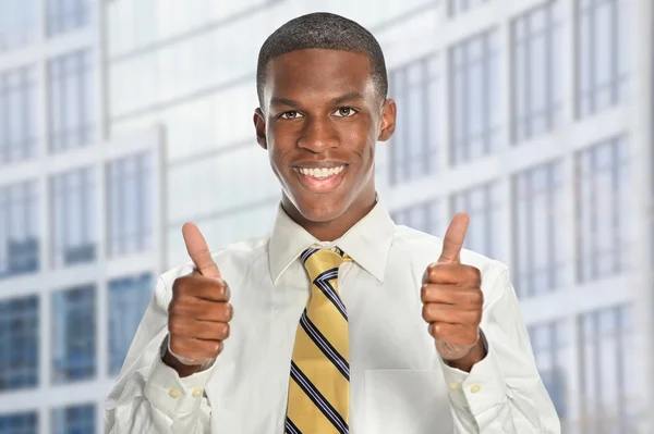 Hombre de negocios mostrando pulgares hacia arriba —  Fotos de Stock