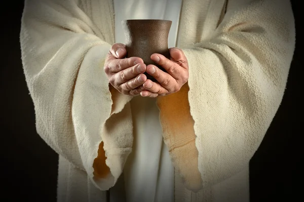 Przytrzymanie Pucharu wina ręce Jezusa — Zdjęcie stockowe