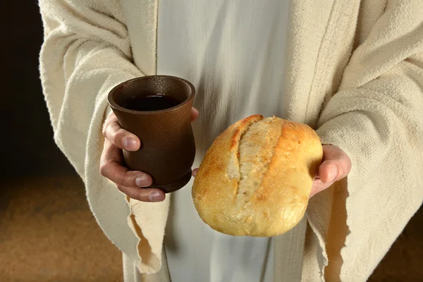 Jesus houden van brood en wijn — Stockfoto