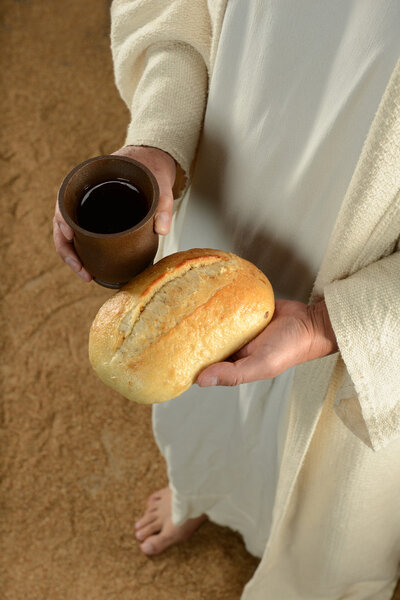 Jesus Hands Holding Bread and Wine