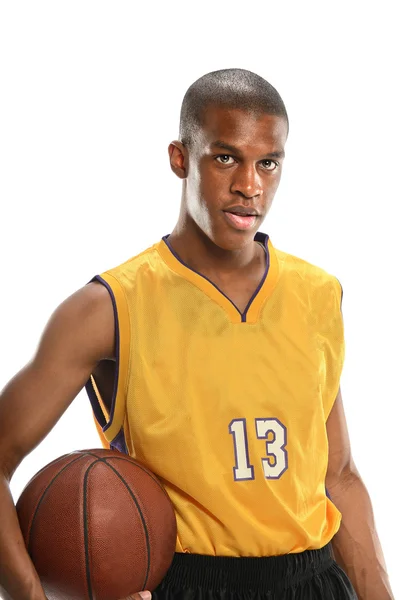 Jugador de baloncesto sosteniendo pelota — Foto de Stock