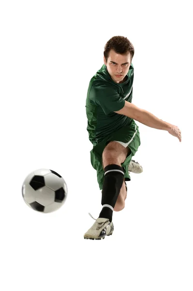 Fußballer kickt Ball — Stockfoto