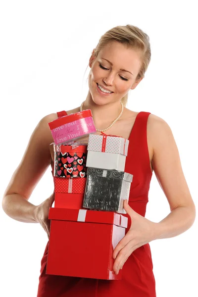 Mujer sosteniendo cajas de regalo — Foto de Stock