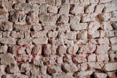 Kayalardan yapılmış eski bir duvarın arka planı.