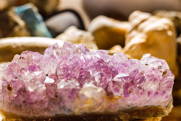 Amethyst rock on the table of a geology student.