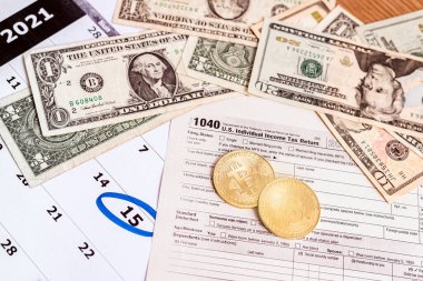 Bitcoin yatırımcılarının gelir beyan etmek için 1040 numaralı formu doldurmaları gerekiyor.