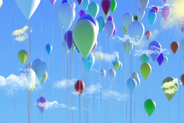 Farbige Luftballons am Himmel — Stockfoto