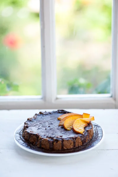 Chocolate cake with fruits — Stock Photo, Image