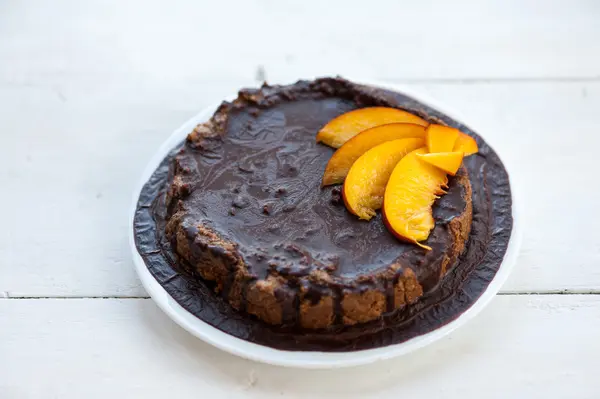 Chocolate cake with fruits — Stock Photo, Image