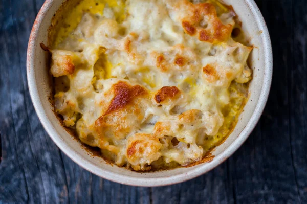 Baked cauliflower with cheese and eggs — Stock Photo, Image