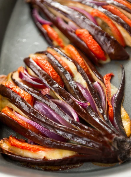 Baked eggplant with tomatoes and cheese — Stock Photo, Image