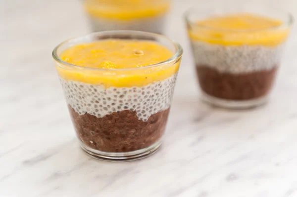 Chia seeds pudding with mango puree — Stock Photo, Image