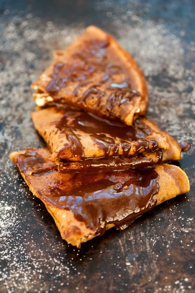 Chocolate pancakes with syrup — Stock Photo, Image