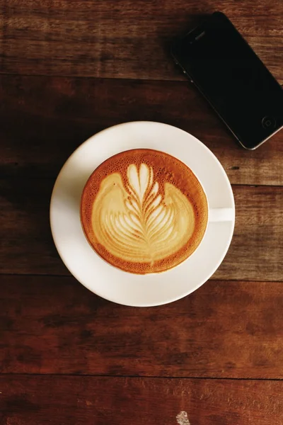 Coffee latte art in coffee shop — Stock Photo, Image