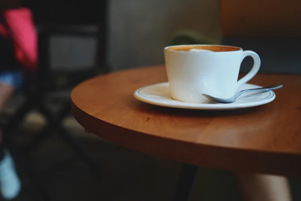 Cup of coffee in coffee shop — Stock Photo, Image