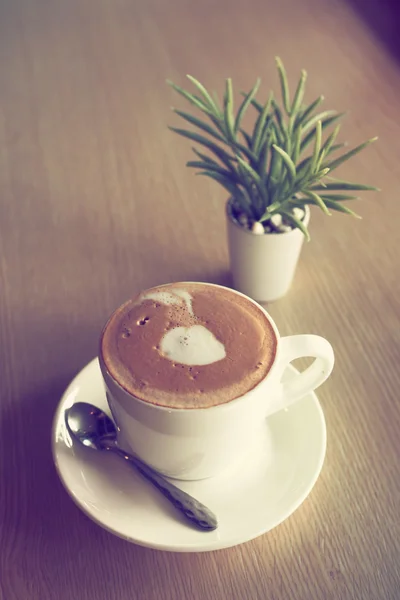 Cup of coffee in coffee shop — Stock Photo, Image