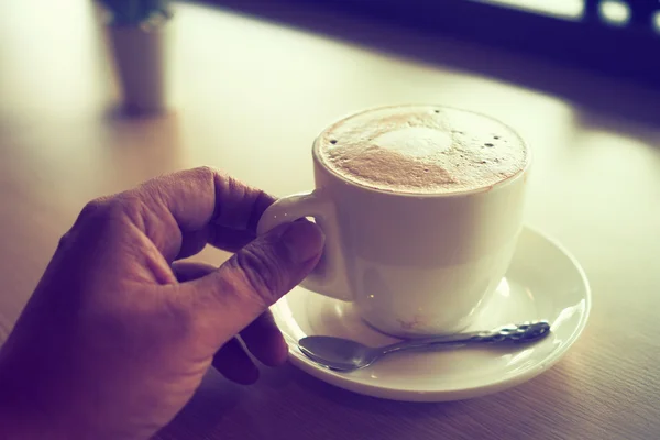 Cup of coffee in coffee shop — Stock Photo, Image