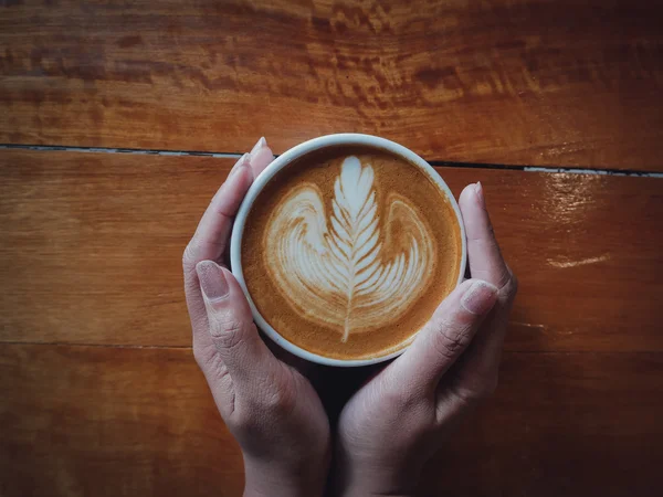 Coffee latte art in coffee shop — Stock Photo, Image