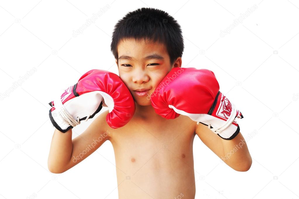 portrait of happy young kid with boxing glove 