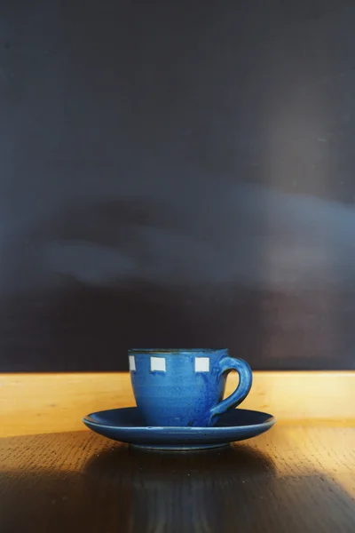 Vintage odcień filiżanki kawy w kawiarni tabeli — Zdjęcie stockowe
