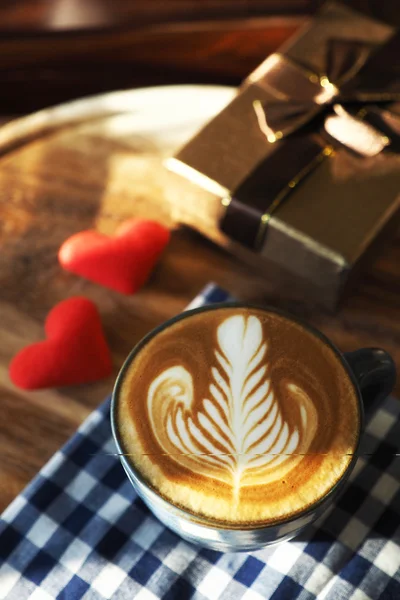 Vintage color tone of  cup of coffee with red heart on the table — Stock Photo, Image