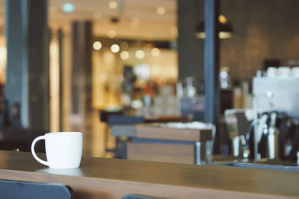 Cup of Coffee in coffee shop vintage color tone style — Stock Photo, Image