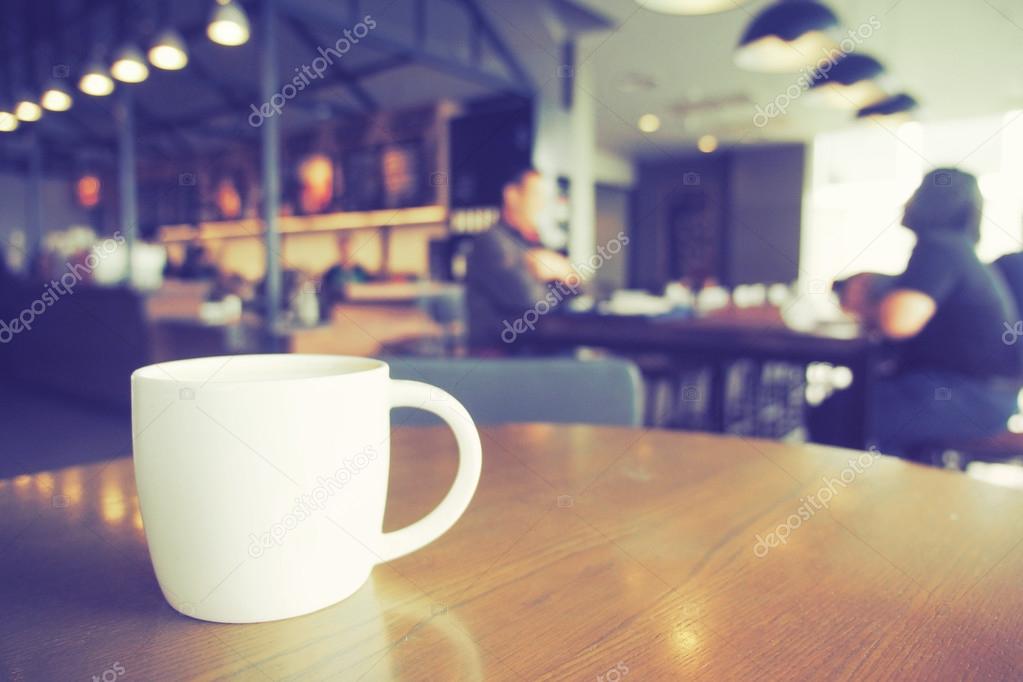 Cup of Coffee in coffee shop vintage color tone style