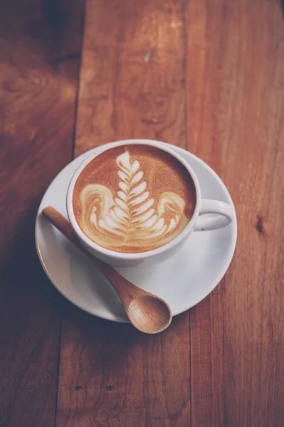 Kopp kaffe latte på trä textur — Stockfoto