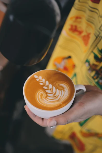 Cup of coffee latte on the wood texture — Stock Photo, Image