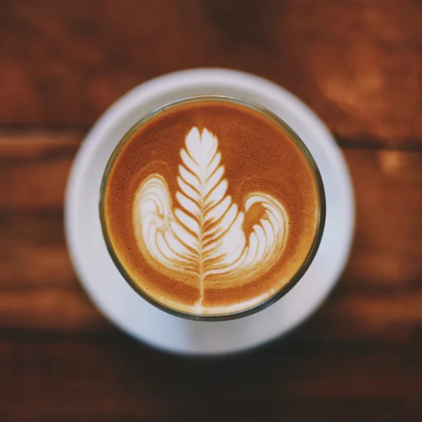 Káva latte art v kavárně — Stock fotografie