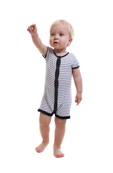Állandó baba fiú, úgy néz ki, és a kezét előre — Stock Fotó