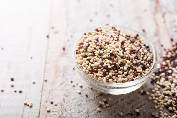 Pile of mixed raw quinoa — Stock Photo, Image