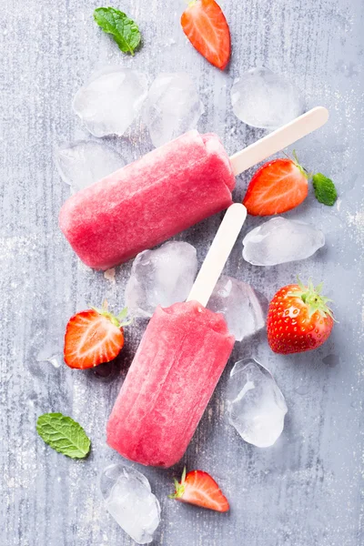 Homemade strawberry popsicles