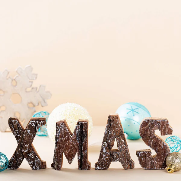 Christmas background with standing wooden letters — Stock Photo, Image
