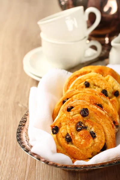 Fresh gluten free sweet swirl buns with raisins — Stock Photo, Image