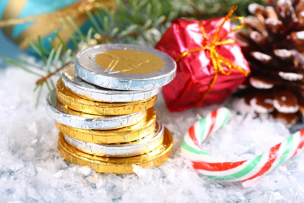 Christmas composition with stacked chocolate euro coins Stock Picture