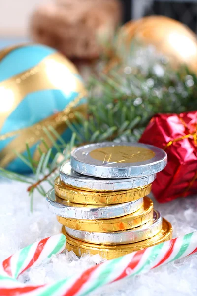 Christmas composition with stacked chocolate euro coins — Stock Photo, Image