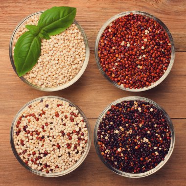 White, red, black and mixed raw quinoa grain clipart