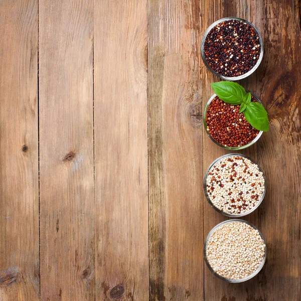 White, red, black and mixed raw quinoa grain — Stock Photo, Image