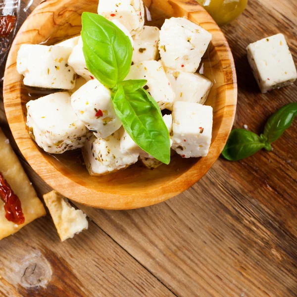 Cubes of feta cheese with olives — Stock Photo, Image