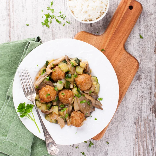 Chicken meatballs with oyster mushrooms — Stock Photo, Image