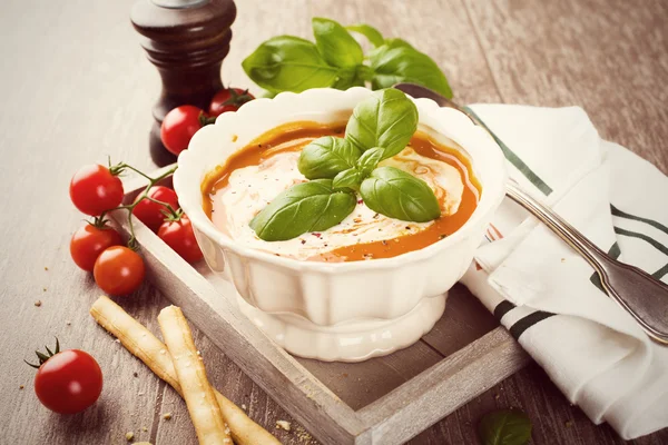 Fresh tomato soup  with basil and cream — Stock Photo, Image