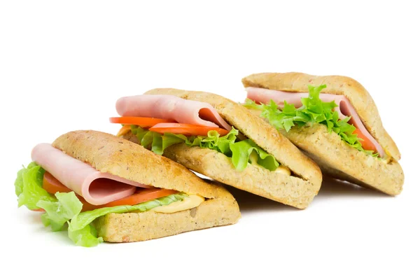 Tři sendviče s plátkem šunky — Stock fotografie