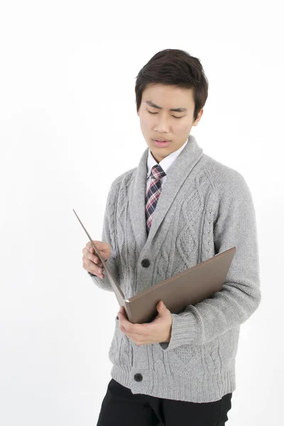 Молодой Азиатский Бизнесмен Проверяет Файл — стоковое фото