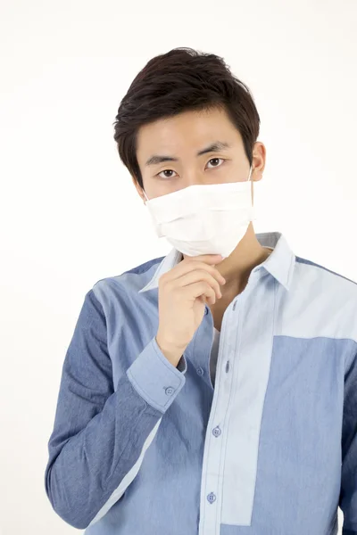 Asian man wearing a face mask Stock Image