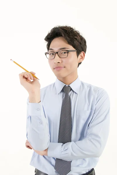 Asiatisk manlig student med en blyertspenna — Stockfoto