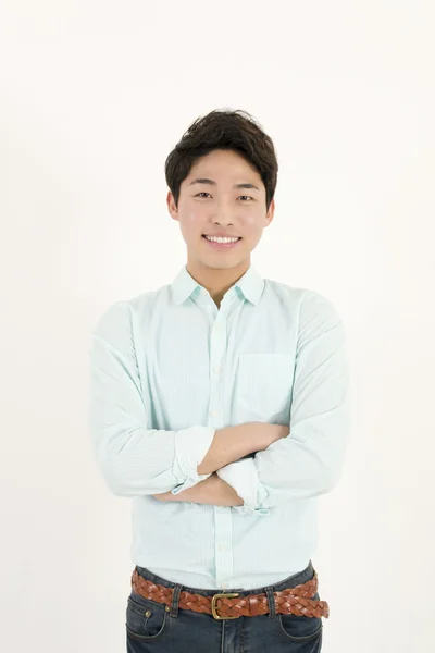 Asiatiska stilig manlig student med armarna korsade — Stockfoto