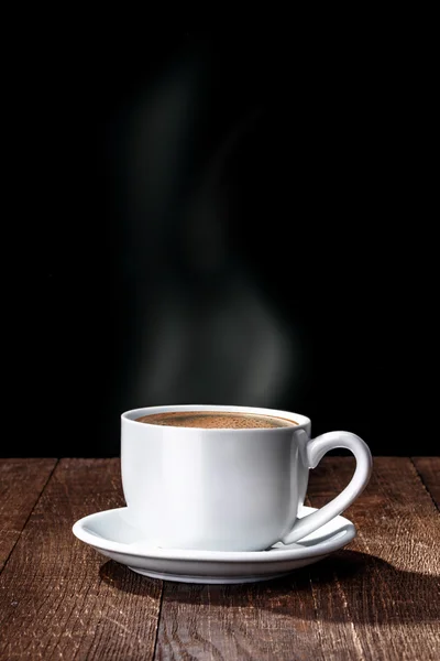Xícara de café em uma madeira — Fotografia de Stock