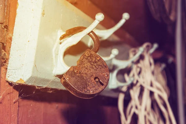 Padlock on hanger — Stock Photo, Image