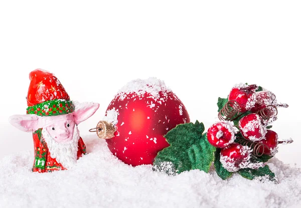 Christmas ball in the snow with rowan — Stock Photo, Image